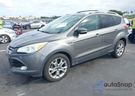 2014 Ford Escape Titanium z USA, uszkodzony, nr VIN 1FMCU0JX3EUA82007